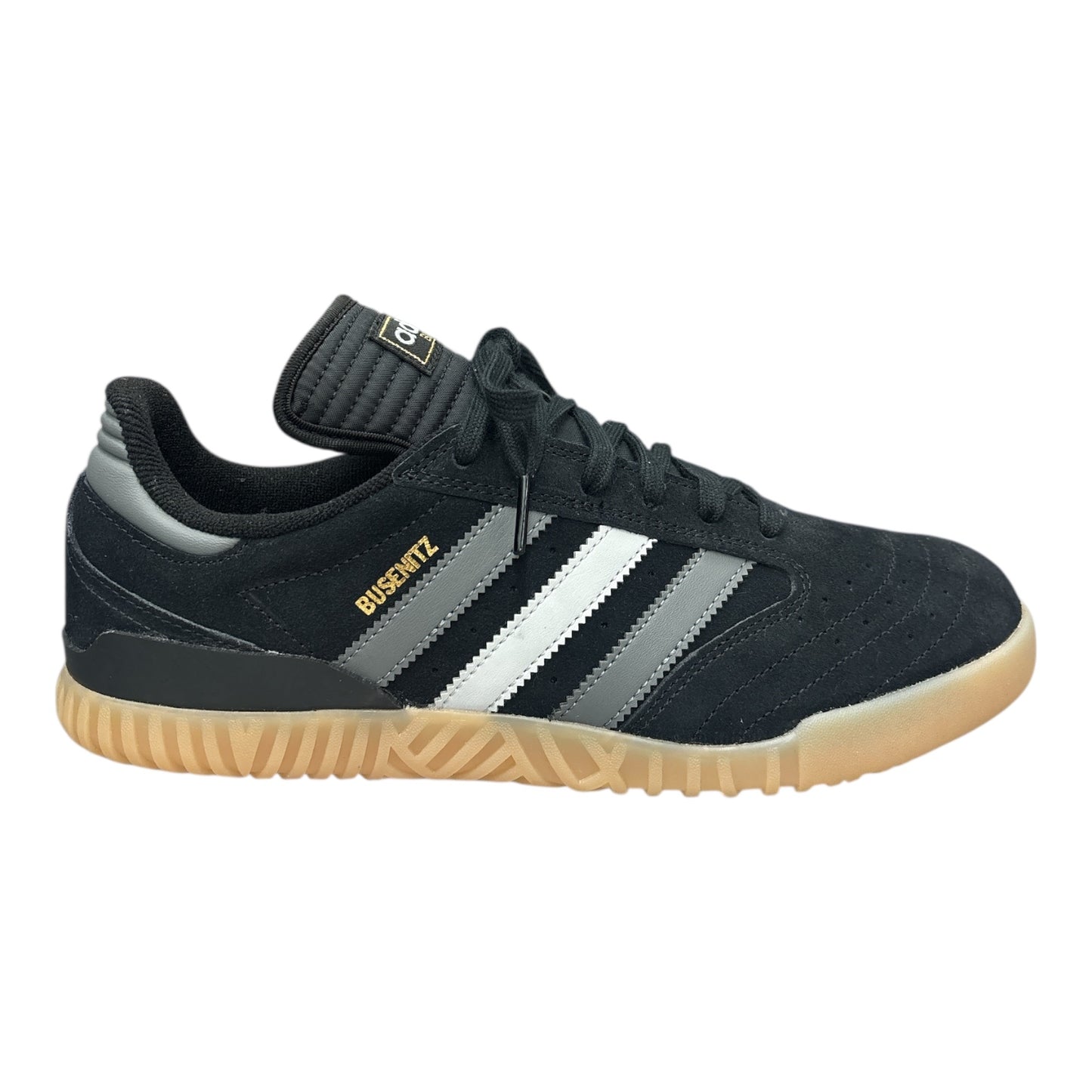 Black Adidas Busenitz Indoor Soccer Shoe with Gum Sole and Grey Stripes.