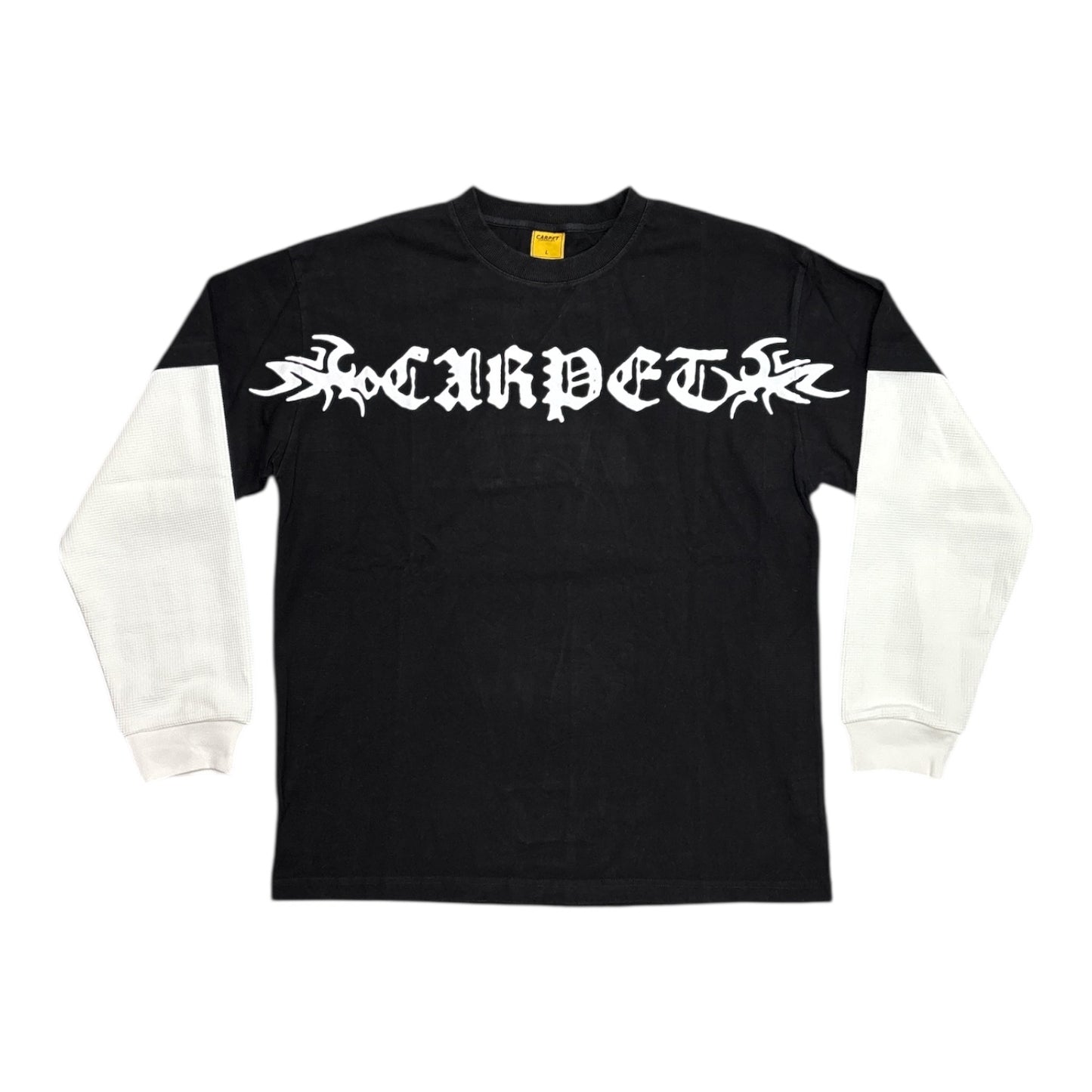 Black and white long-sleeve shirt with 'CARPET' logo on a white background
