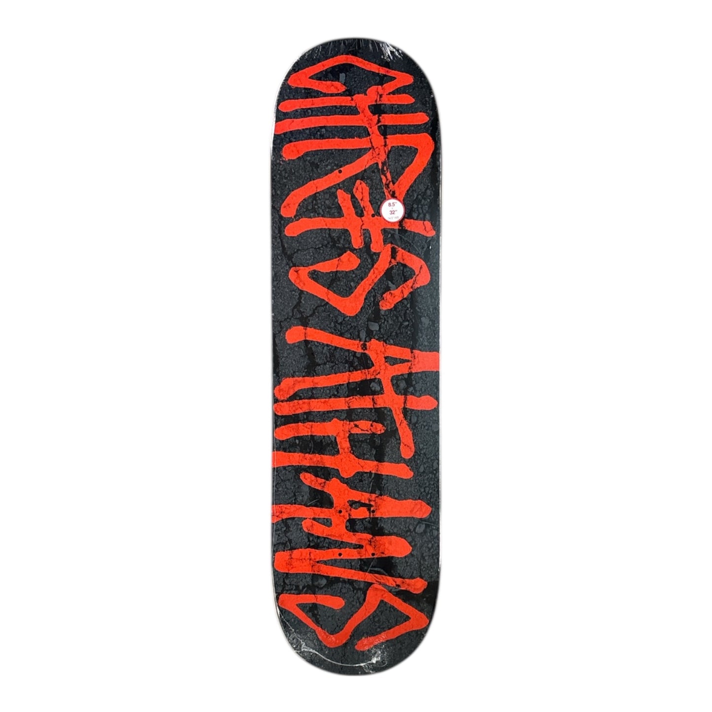 Black skateboard deck with red text on a white background