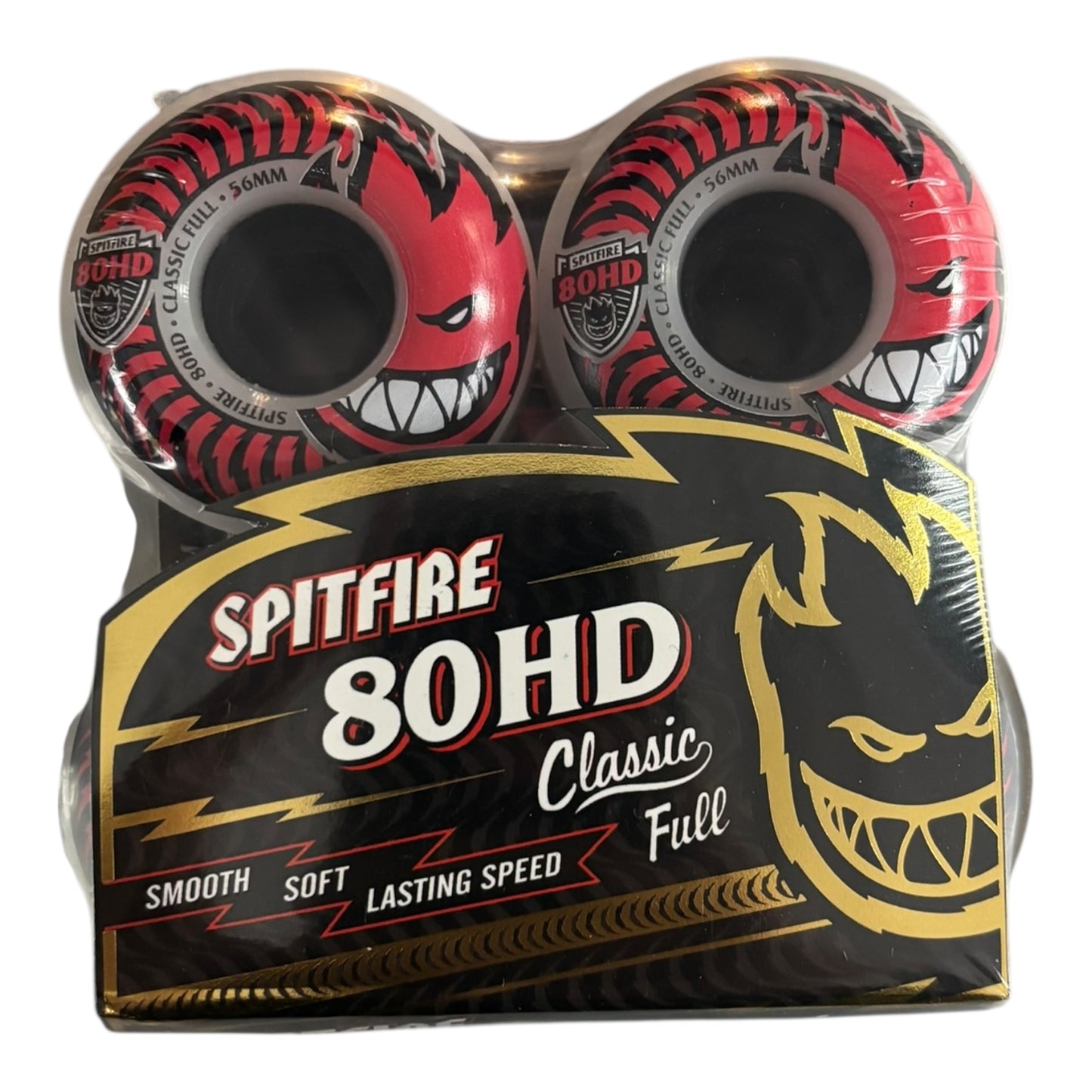 Spitfire skateboard wheels with red and black design on a white background