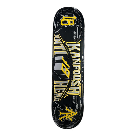 Skateboard deck with black and yellow design on a white background