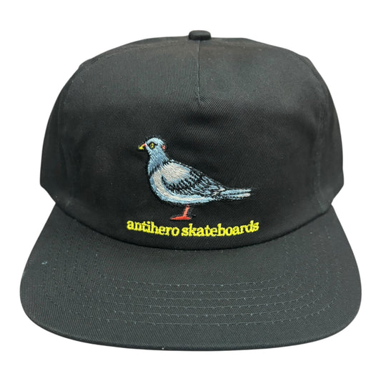 Black cap with embroidered bird design and 'antihero skateboards' text on a white background