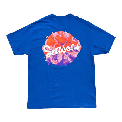 Blue Tee with Seasons Blotch Logo in Multiple Colors Swirled on a Full Back Print