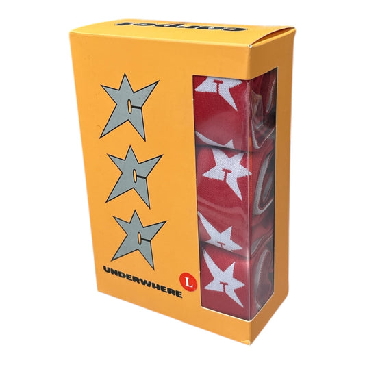Box of red socks with white stars, featuring the brand 'Underwhere' on a yellow background.