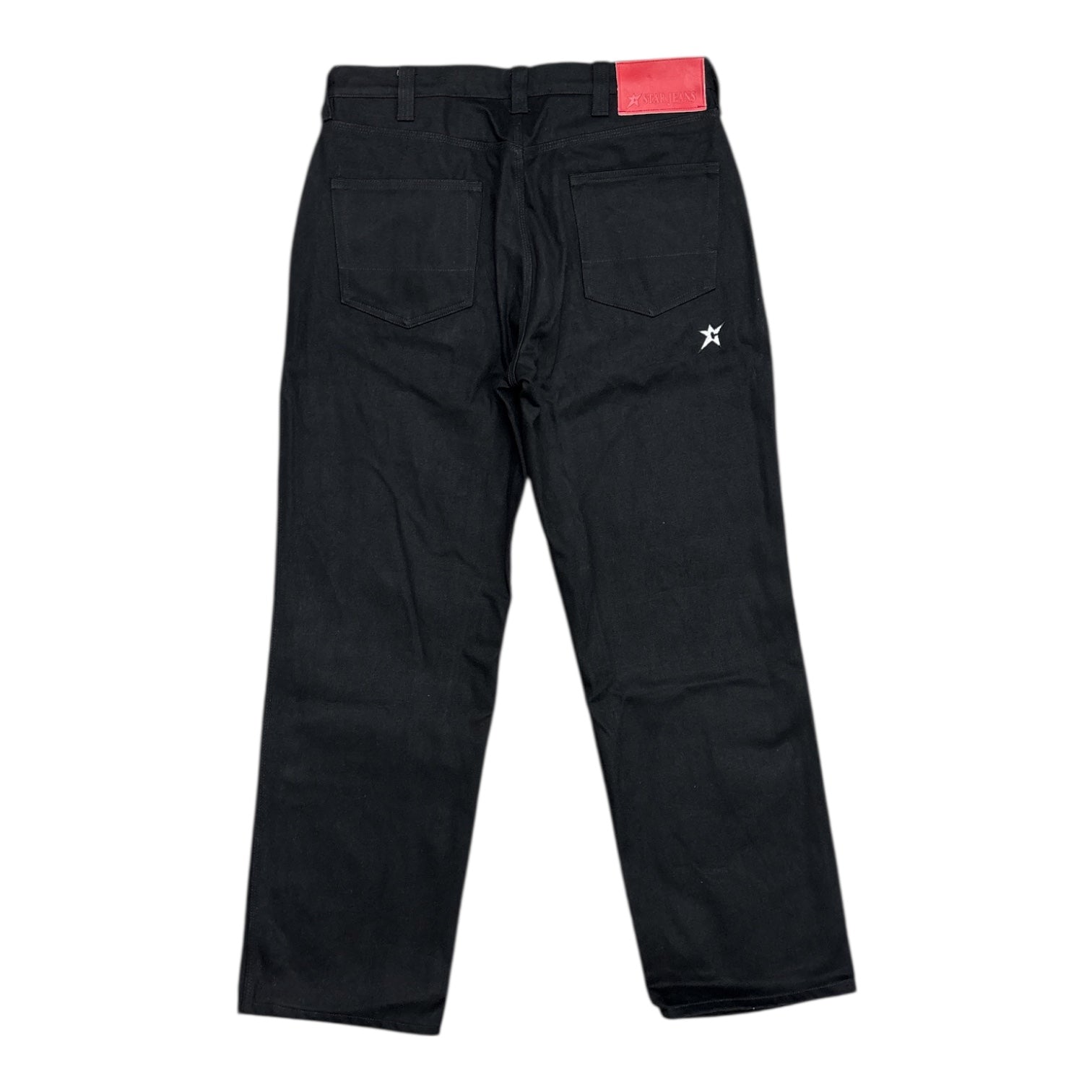 Black pants with a red tag on a white background