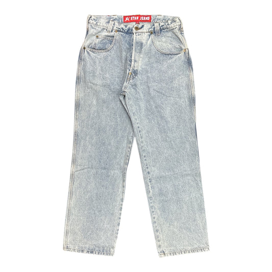 Light blue jeans with a brand label on a white background