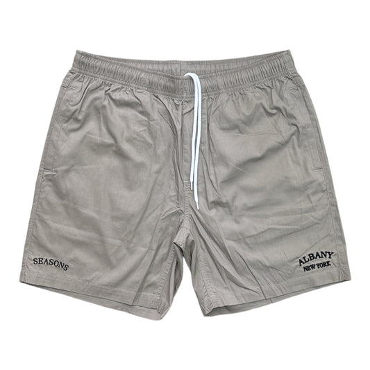 Light grey shorts with seasons embroidered on right leg and albany New York on left leg
