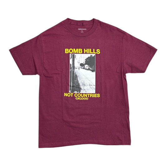 Maroon t-shirt with graphic design and text on a white background