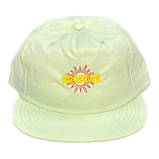 Mint color hat with embroidered sun with seasons text