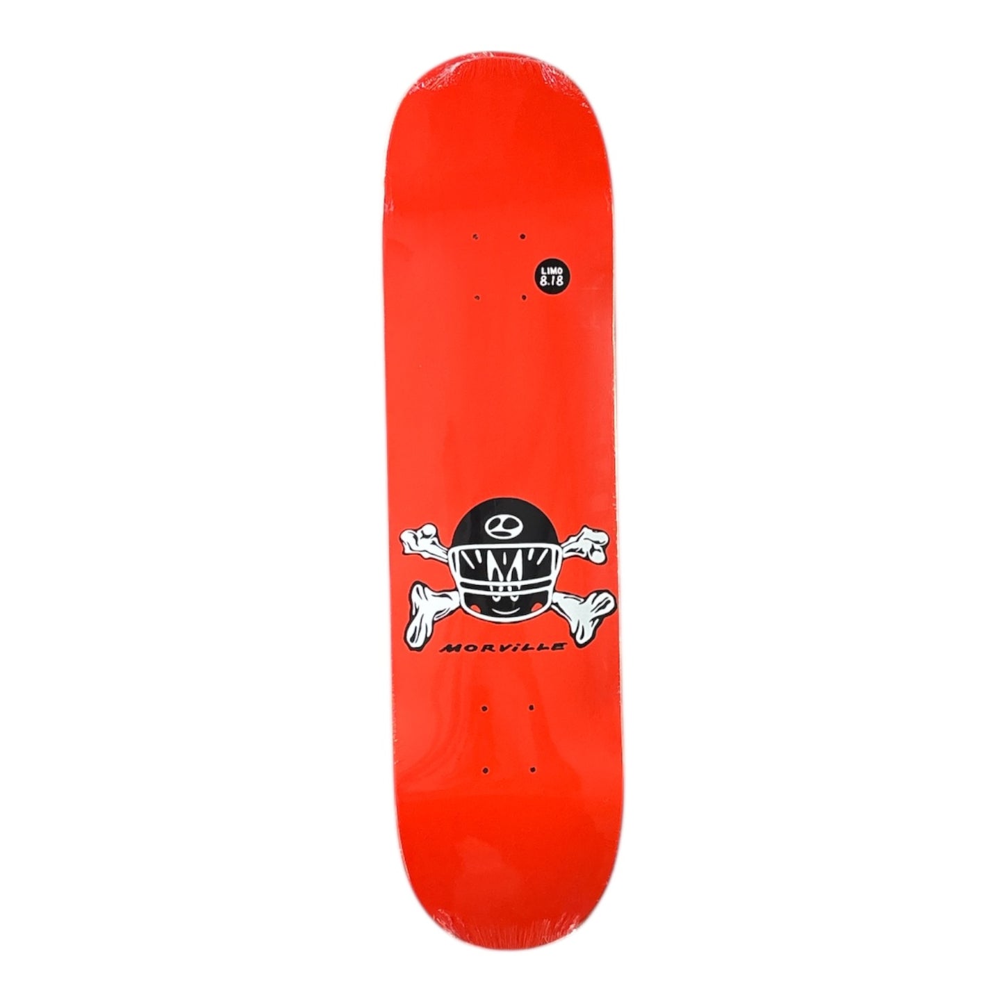 Red skateboard deck with a black and white skull design on a white background