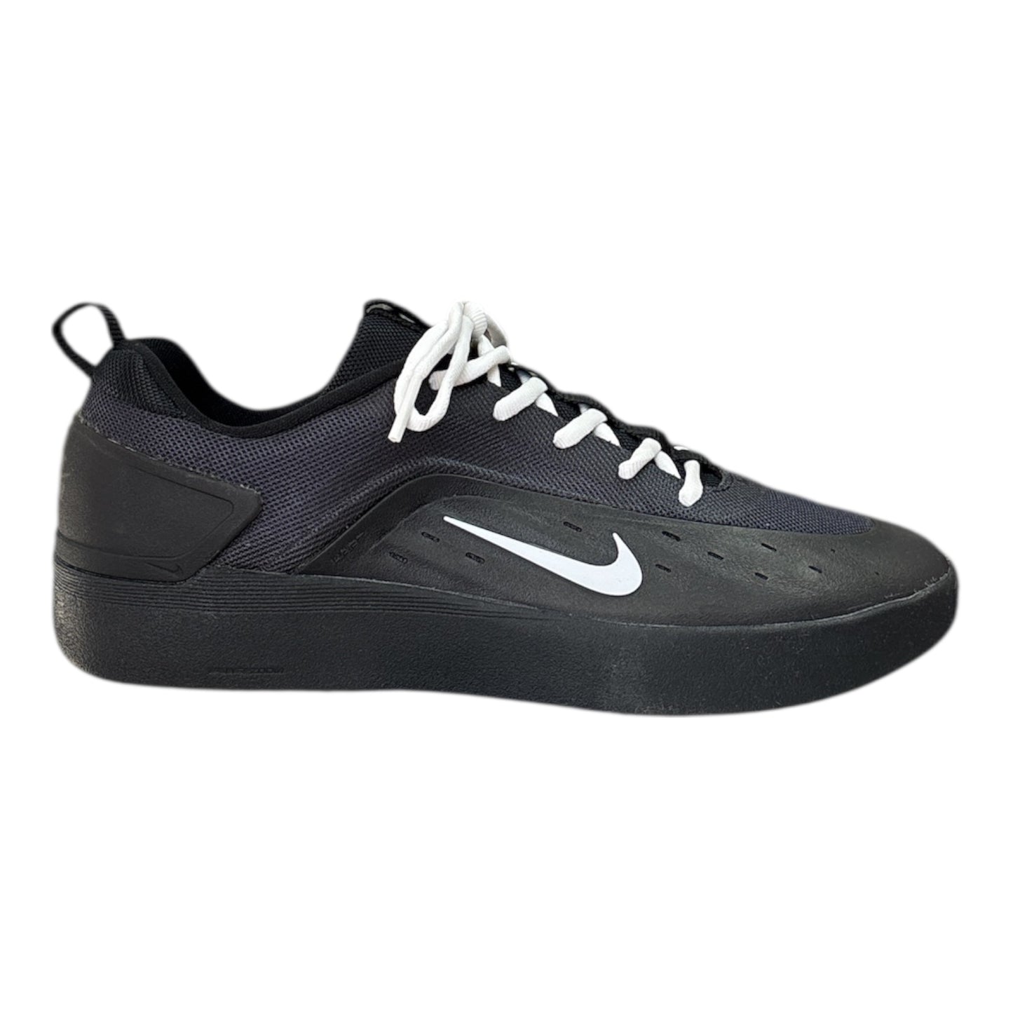 Black athletic shoe with white Nike logo on a white background