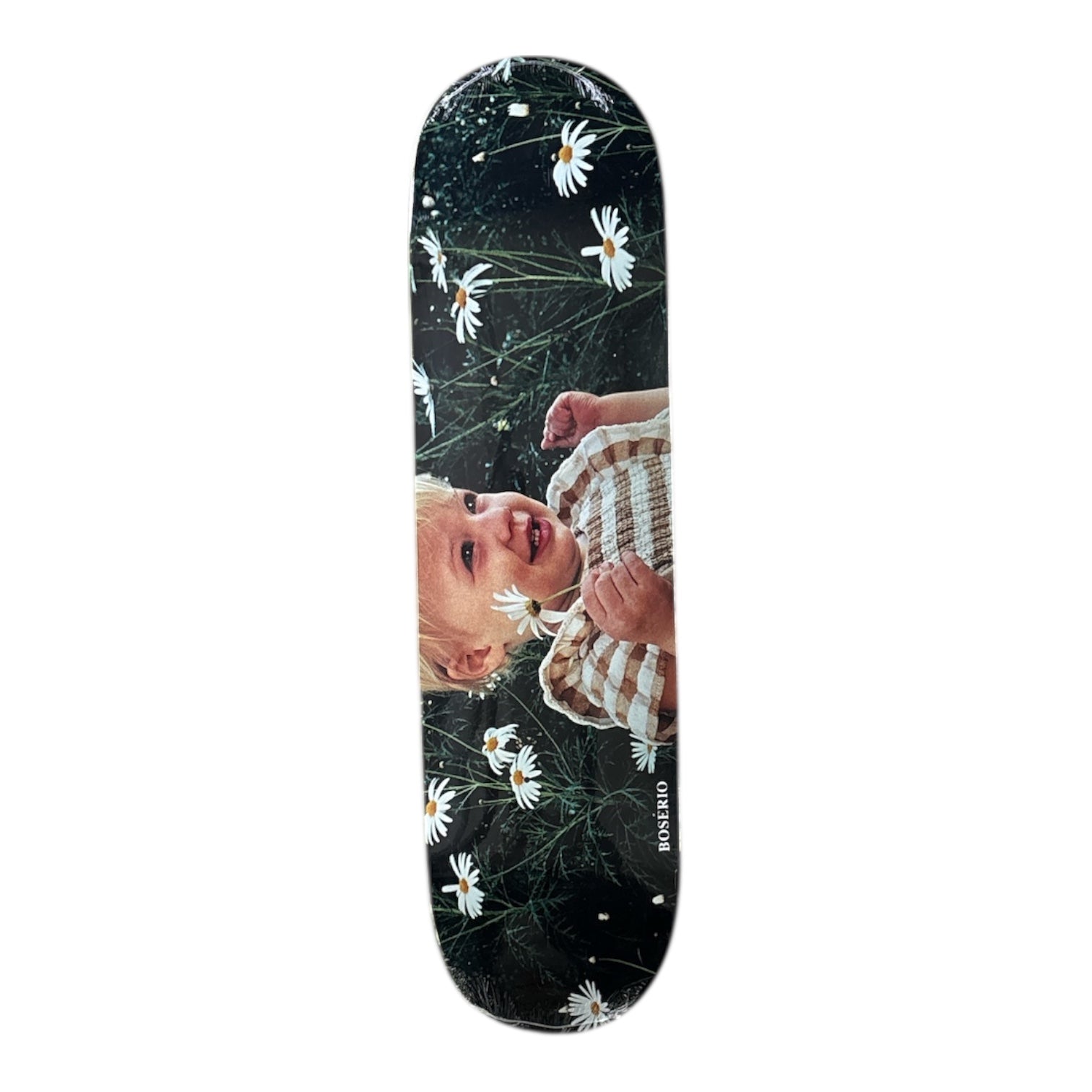 Skateboard deck with a design of a baby holding flowers on a black background