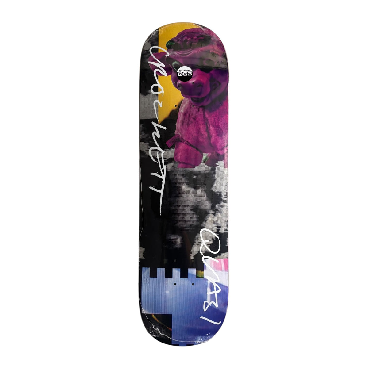 Skate Deck With a Pink Cow And Quasi with Crockett written across  the sides.