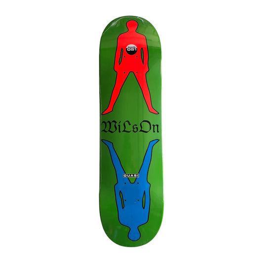 A green skateboard deck featuring a red human silhouette graphic on top, the text 'wilsOn' in black Gothic font, and a blue human silhouette upside down below, with 'QUATTRO' printed in small white letters on the blue figure.