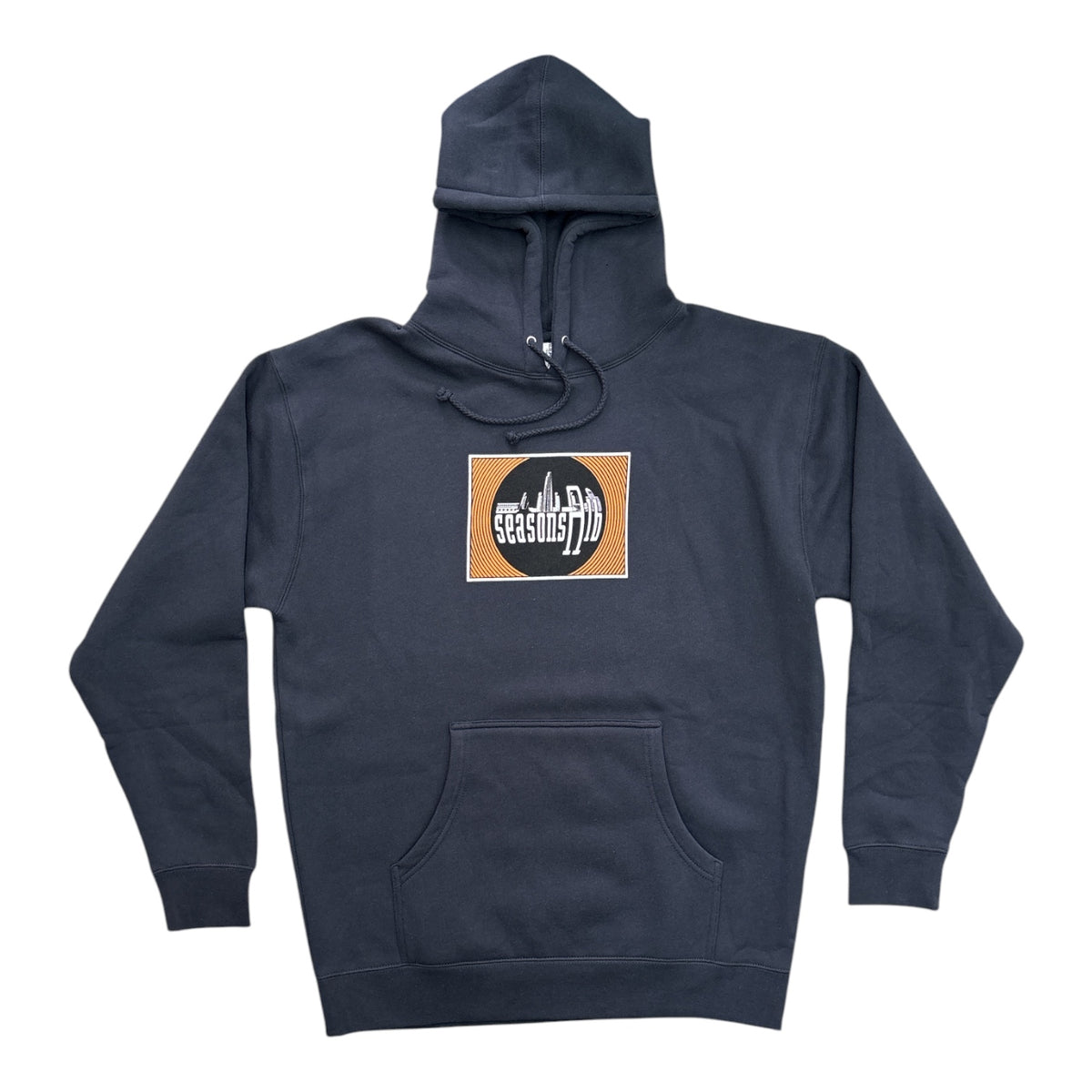 A navy blue pullover hoodie with a front kangaroo pocket and a square chest graphic. The graphic features a black circle with white stylized text reading 'Seeking Truth' over a tan background, displayed on a clean white background.