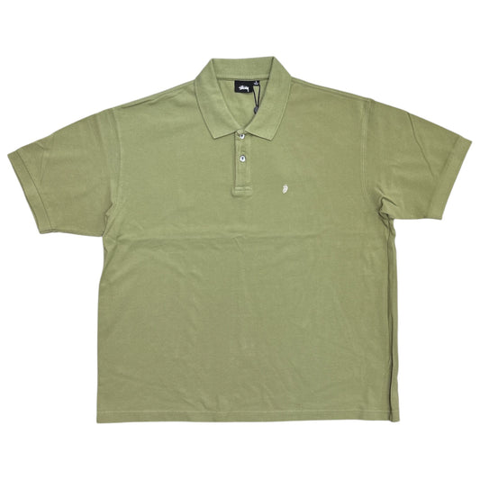 An olive green short-sleeve polo shirt with a two-button placket and a small white embroidered logo on the left chest, laid flat against a white background.