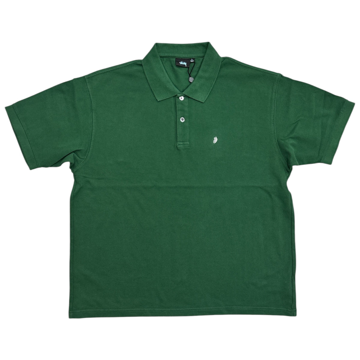 A dark green short-sleeve polo shirt with a two-button placket and a small white embroidered logo on the left chest, displayed flat against a white background.