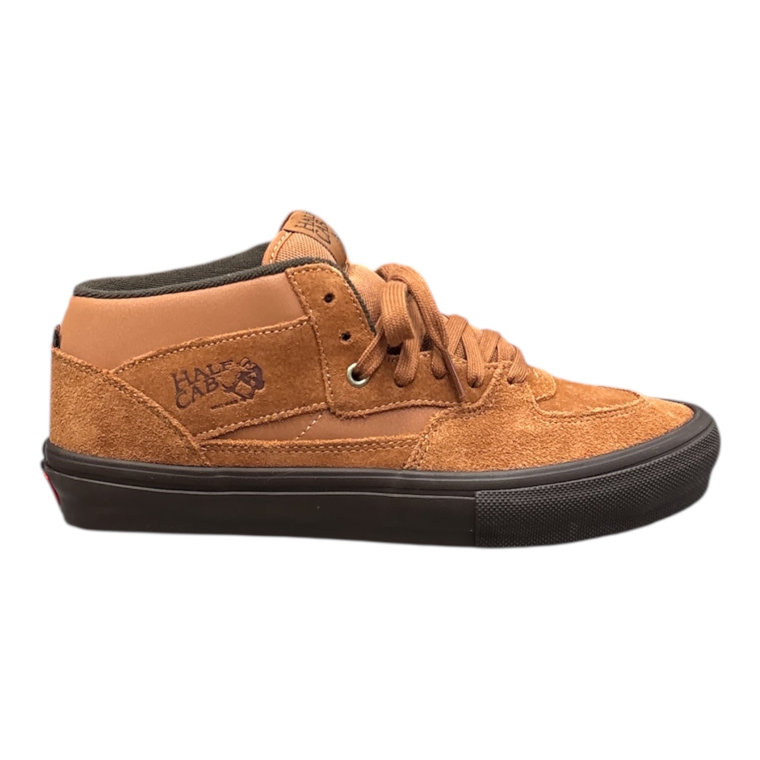 Brown sneaker with gum sole on a white background