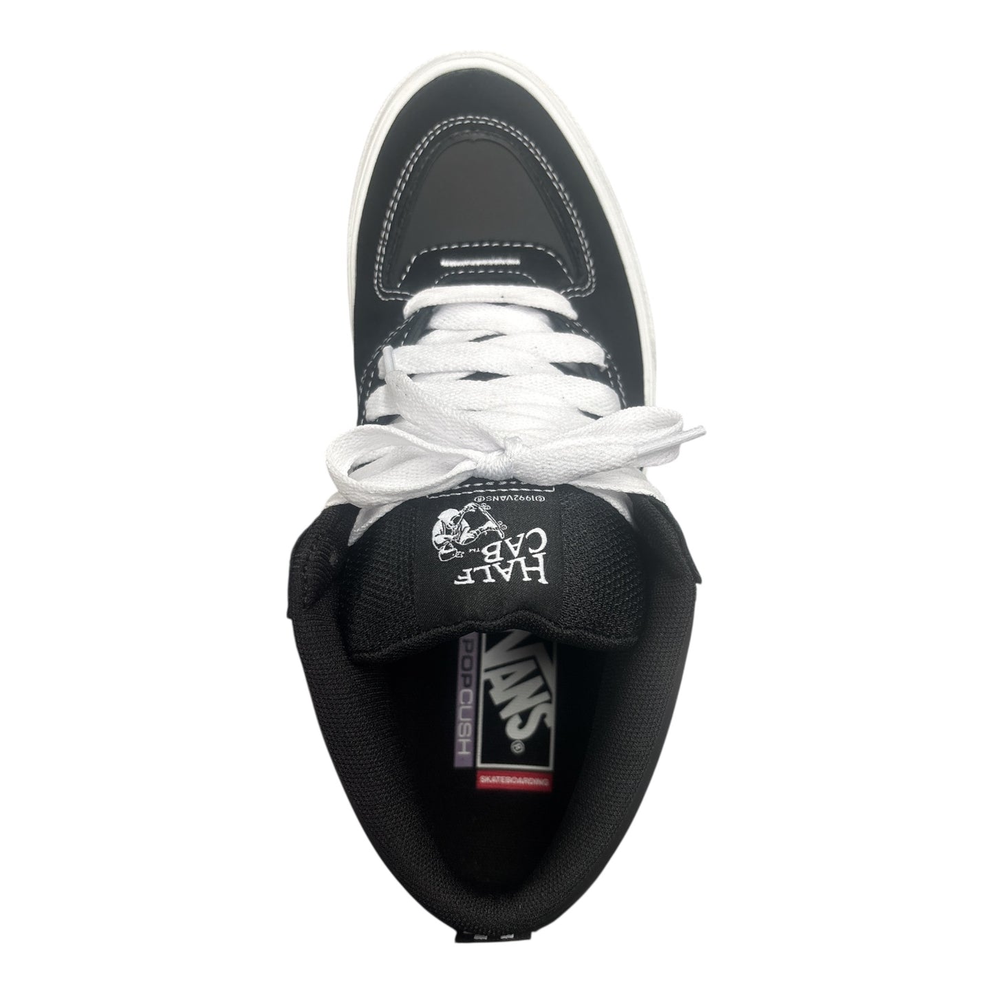 Black sneaker with white laces on a white background